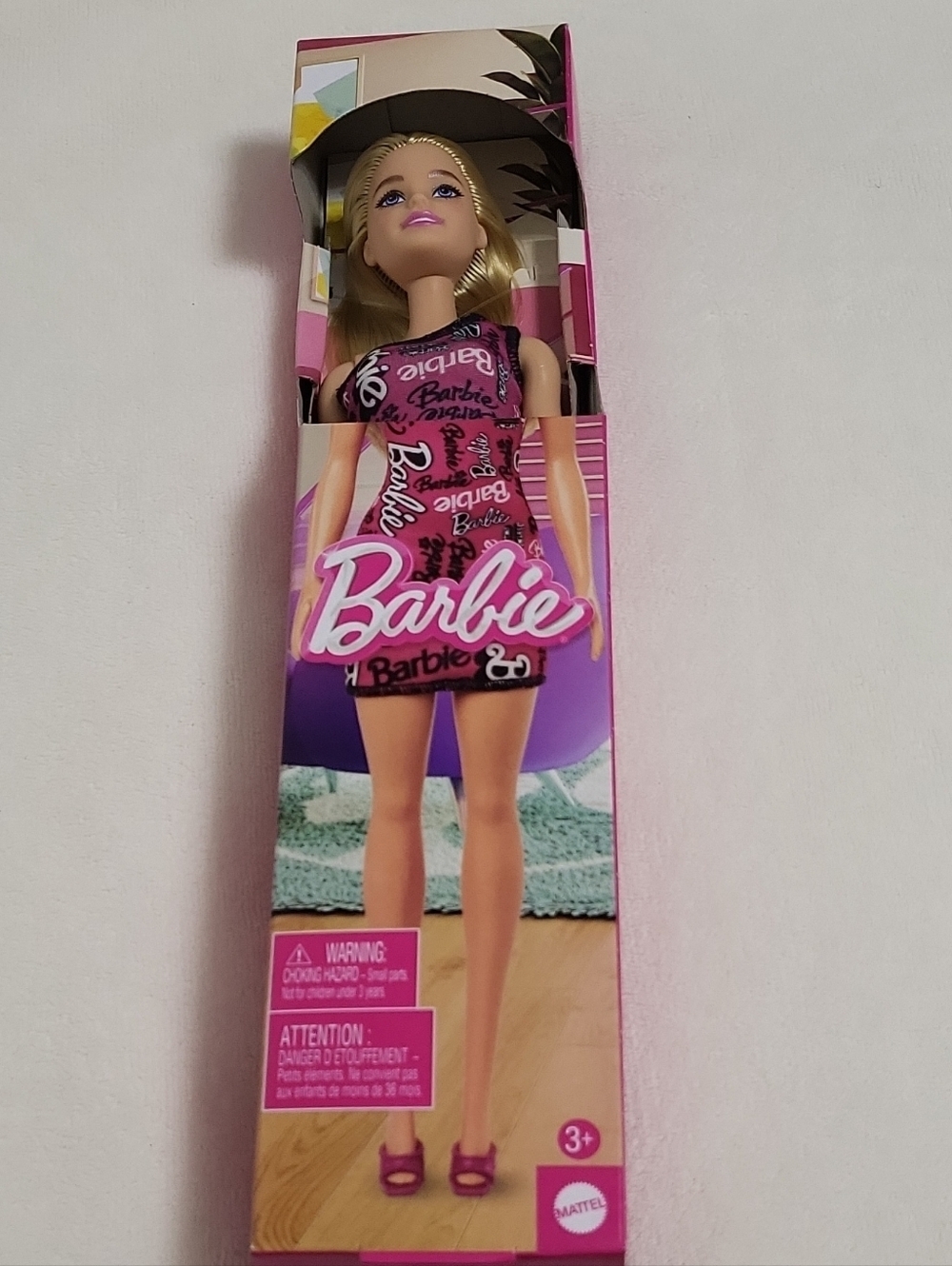 Mattel Barbie Doll in Pink Logo Print Dress with Purple Accents
